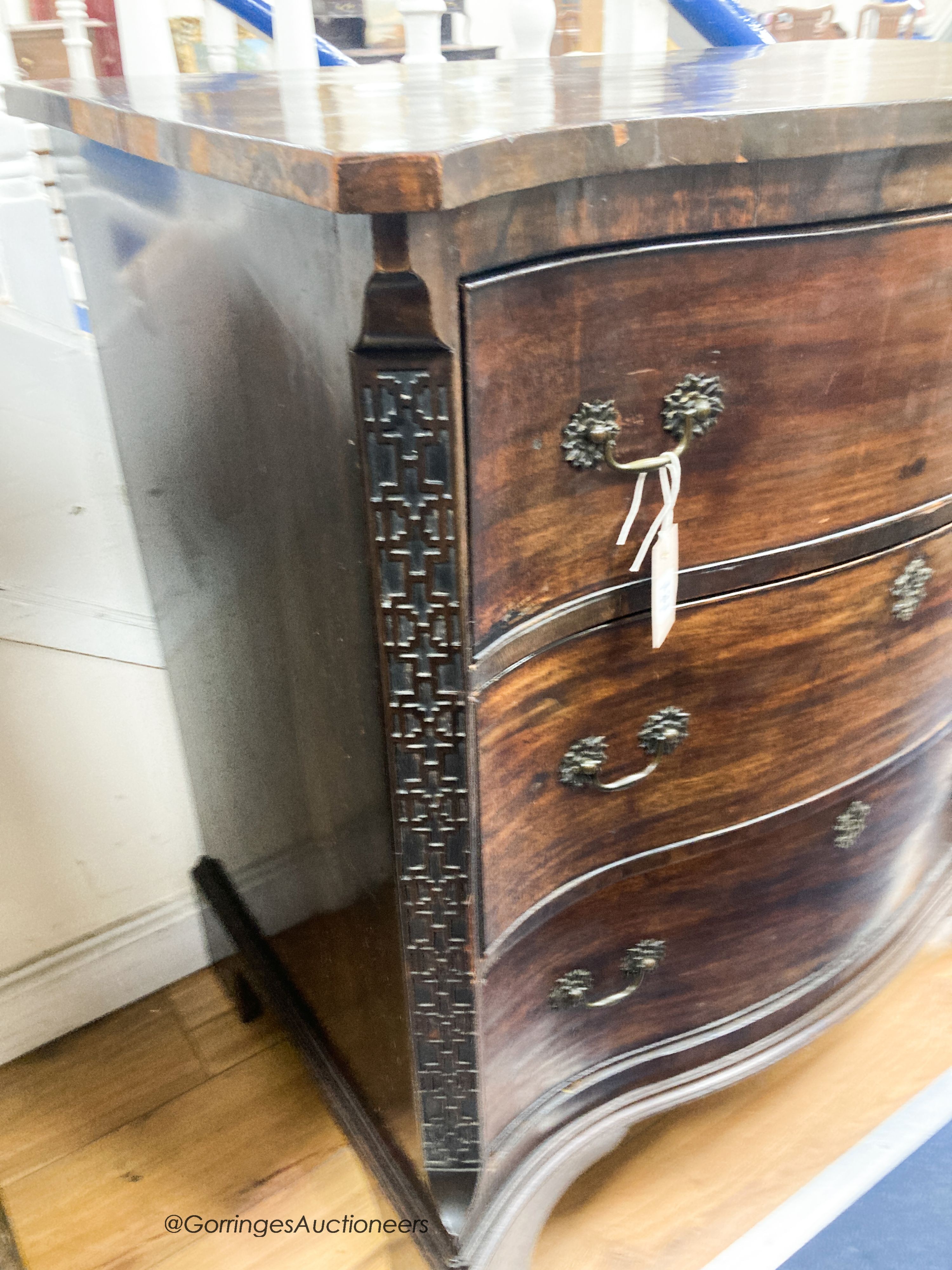 A George III style mahogany serpentine secretaire chest, width 87cm, depth 56cm, height 96cm